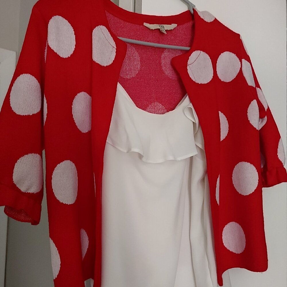 White top with polka dot sweater